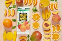 Orange Peach Mango Juices Image 2