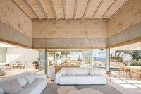 Minimal White-Plastered Hillside Villas Image 1