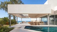 Minimal White-Plastered Hillside Villas Image 2