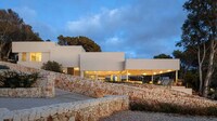 Minimal White-Plastered Hillside Villas Image 3