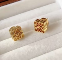 Labyrinth-Inspired Earring Designs Image 1