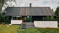 Estonian Forest-Based Wooden Homes Image 1