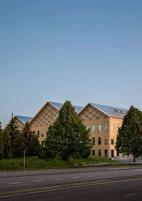 Timber Log-Crafted Cultural Centers Image 2