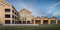 Timber Log-Crafted Cultural Centers Image 3