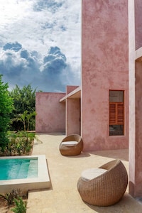 Pink Plaster Limestone Homes Image 2