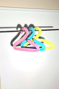 Deflated Balloon Clothing Hangers Image 1