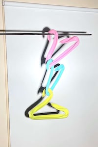 Deflated Balloon Clothing Hangers Image 2