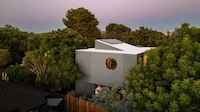 Daylight-Filled Treetop Residences Image 1