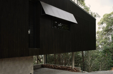 Angular Black Cantilevered Homes