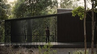 Angular Black Cantilevered Homes Image 2