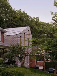 Diamond-Shaped Paneled Homes Image 2