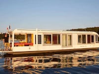 Solar-Powered Compact Houseboats Image 2
