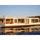 Solar-Powered Compact Houseboats Image 2