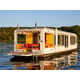 Solar-Powered Compact Houseboats Image 3