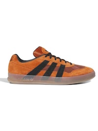 Collaborative Asymmetric Sneakers Image 1