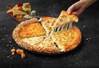 Globally Inspired Cheese Pizzas Image 1