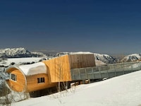 Mountainous Elliptical House Image 1