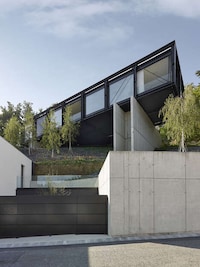 Footbridge-Inspired Hillside Homes Image 2