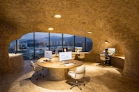 Illuminated Cave-Like Offices