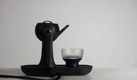 Connected Communicative Tea Sets Image 2