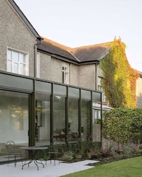 Window-Lined Country Home Extensions Image 1