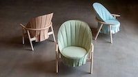Draped Fabric-Clad Lounge Chairs Image 1
