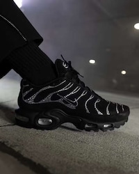 Crystal-Encrusted Stealthy Sneakers Image 1