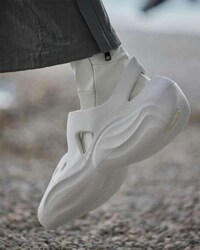 Aerodynamic Perforated Footwear Image 2