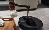Arm-Equipped Robotic Vacuums Image 1
