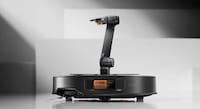 Mechanical Arm-Attached Robot Vacuums Image 2