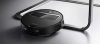 Mechanical Arm-Attached Robot Vacuums Image 3