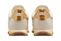 Metallic-Tinged Retro Sneaker Models Image 4