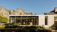 Limestone-Clad Expansive Extensions