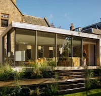 Limestone-Clad Expansive Extensions Image 2