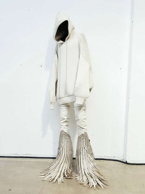 Bird Feather-Inspired Boots