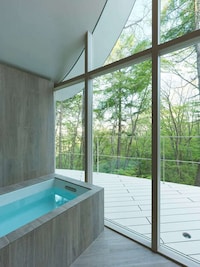 Intertwined Forest-Nestled Cottages Image 3