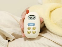 Adorable Pebble-Shaped Warmers Image 2