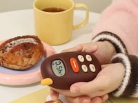 Adorable Pebble-Shaped Warmers Image 4