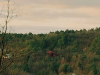Compact Red Wooden Homes Image 2
