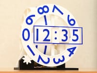 Mechanical Digital Mesmerizing Clocks