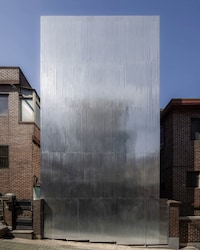 Steel Facade-Wrapped Residences Image 1