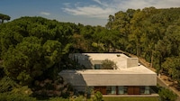 Sloped Site Concrete Residences Image 1
