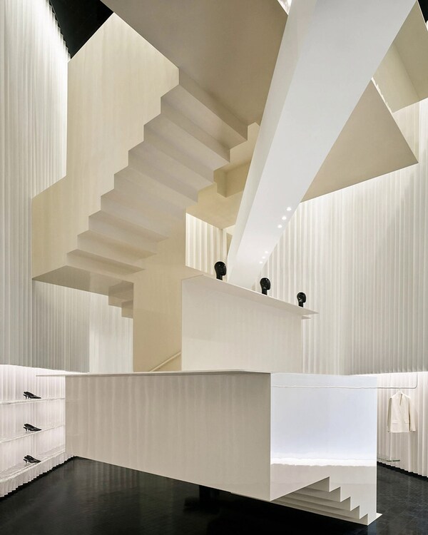 Staircase-Centric Flagship Stores: Herzog & de Meuron Designs the ...