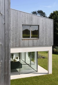 Limestone-Wrapped Rural Residences Image 2