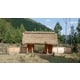Thatched-Roof Wooden Huts Image 1