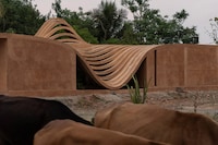 Wavy Concrete Roof-Topped Homes Image 3