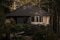 Black-Stained Wooden Cabins Image 4