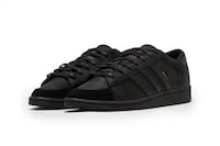 Collaborative Stealthy Sneakers Image 4