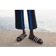Minimal Collaborative Summer Footwear Image 2