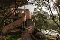 Tree-Surrounded Mud-Walled Residences Image 2